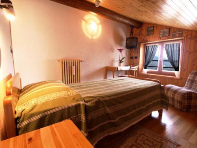 Hotel Alpe Fleurie Чамполук Стая снимка